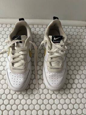 Nike Kids White Sneakers with Yellow Swoosh